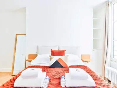 Un ou plusieurs lits dans un hébergement de l'établissement Beautiful modern apartment 3 BDR 6P C ur de Paris