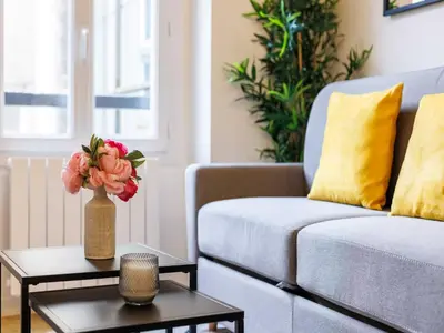Coin salon dans l'établissement Apartment COSY near BASTILLE - Mobility lease