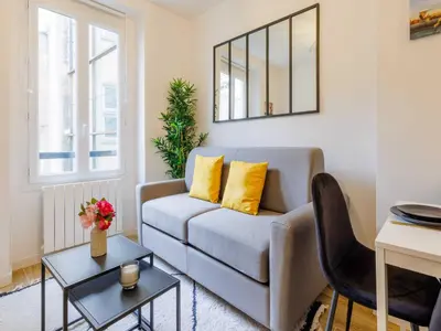 Coin salon dans l'établissement Apartment COSY near BASTILLE - Mobility lease