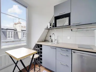 Cuisine ou kitchenette dans l'établissement Cosy & bright studio - 2P - Ternes