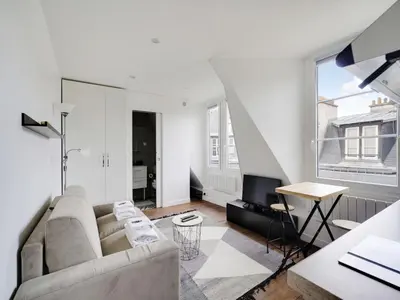 Coin salon dans l'établissement Cosy & bright studio - 2P - Ternes