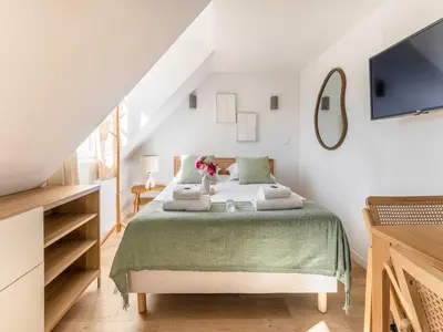Un ou plusieurs lits dans un hébergement de l'établissement Studio COSY in the heart of Paris - Mobility lease
