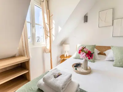 Un ou plusieurs lits dans un hébergement de l'établissement Studio COSY in the heart of Paris - Mobility lease