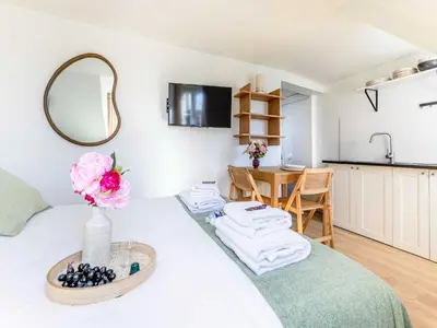 Cuisine ou kitchenette dans l'établissement Studio COSY in the heart of Paris - Mobility lease