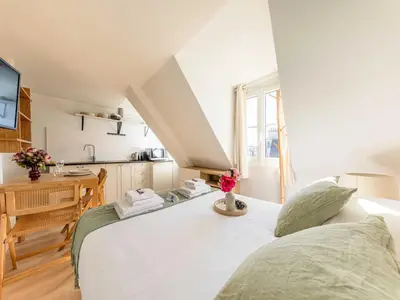 Un ou plusieurs lits dans un hébergement de l'établissement Studio COSY in the heart of Paris - Mobility lease