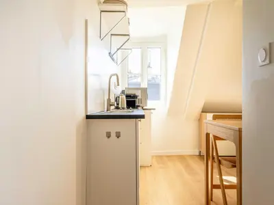 Cuisine ou kitchenette dans l'établissement Studio COSY in the heart of Paris - Mobility lease
