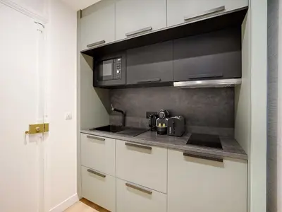 Cuisine ou kitchenette dans l'établissement Charming apartment 1BDR 2P near Parc Monceau