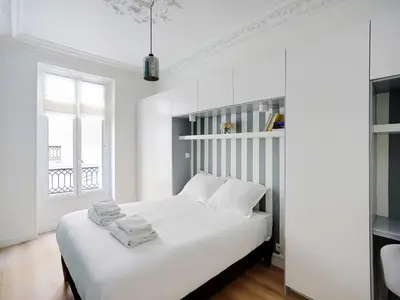 Un ou plusieurs lits dans un hébergement de l'établissement Charming apartment 1BDR 2P near Parc Monceau