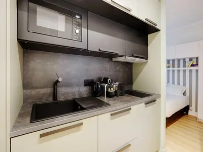 Cuisine ou kitchenette dans l'établissement Charming apartment 1BDR 2P near Parc Monceau