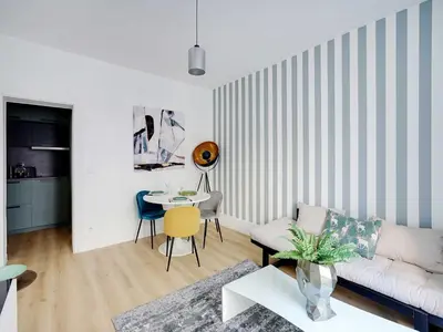 Coin salon dans l'établissement Charming apartment 1BDR 2P near Parc Monceau
