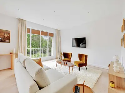 Télévision ou salle de divertissement dans l'établissement Comfortable and modern apt - 2BD 6P - Neuilly