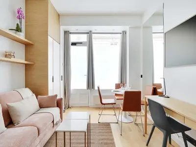 Coin salon dans l'établissement Charming Apt - 1BD 4P - Invalides Bon Marché
