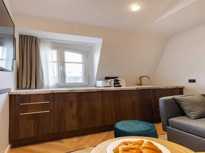Cuisine ou kitchenette dans l'établissement Studio cosy - Wagram Arc Triomphe