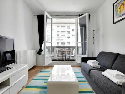 Coin salon dans l'établissement Bright flat - 1BR 4P - Javel