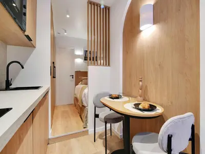 Cuisine ou kitchenette dans l'établissement Charming studio - 16th district - Mobility lease