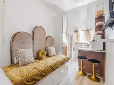 Un ou plusieurs lits dans un hébergement de l'établissement Magnificent studio - 1P -Trocadéro