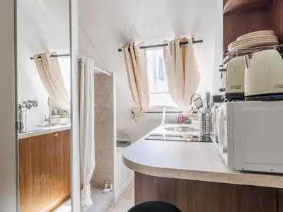 Cuisine ou kitchenette dans l'établissement Magnificent studio - 1P -Trocadéro