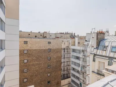 Vue générale sur Paris ou vue de la ville depuis l'appartement