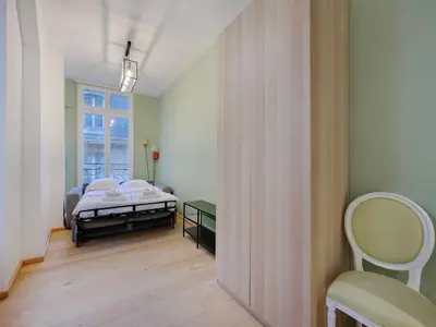 Un ou plusieurs lits dans un hébergement de l'établissement Superb studio 2P - Rivoli Notre-Dame