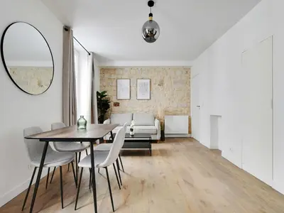 Coin salon dans l'établissement Modern apartment - 2BD 6P - Batignolles