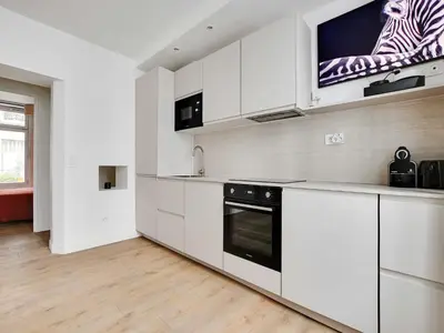 Cuisine ou kitchenette dans l'établissement Modern apartment - 2BD 6P - Batignolles
