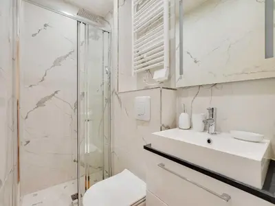 Salle de bains dans l'établissement Modern apartment - 2BD 6P - Batignolles