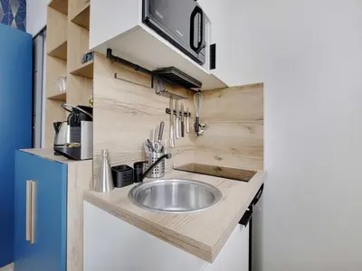 Cuisine ou kitchenette dans l'établissement Studio COSY 2P - Boulogne Rolland garros