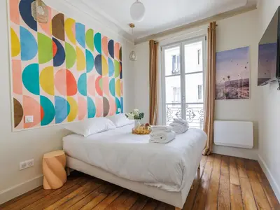 Un ou plusieurs lits dans un hébergement de l'établissement Charming apartment - 2 BDR 4P -St Germain des Prés