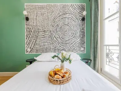 Un ou plusieurs lits dans un hébergement de l'établissement Charming apartment - 2 BDR 4P -St Germain des Prés