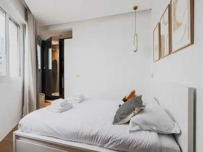 Un ou plusieurs lits dans un hébergement de l'établissement Magnificent Appt - 3BD 6P with balcony - Neuilly