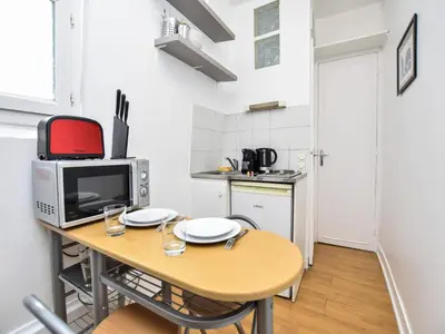 Cuisine ou kitchenette dans l'établissement Cosy 2P - Montmartre Sacré coeur