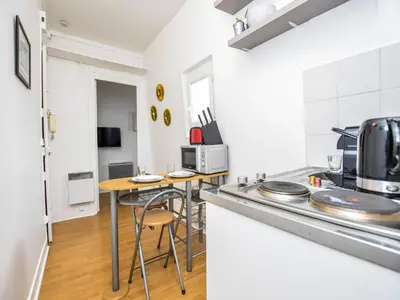 Cuisine ou kitchenette dans l'établissement Cosy 2P - Montmartre Sacré coeur