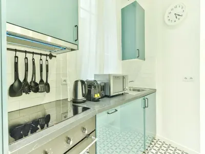 Cuisine ou kitchenette dans l'établissement Magnificent Apartment - 2BR 4P - Grand boulevard