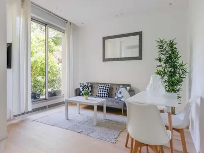 Coin salon dans l'établissement Apartment COSY - 1BDR 2P - Neuilly sur Seine