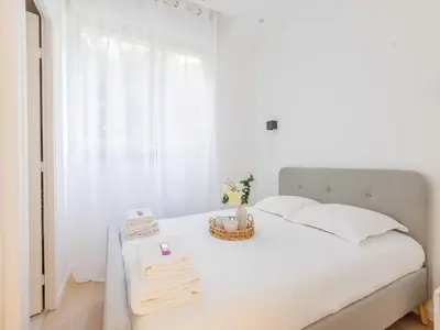 Un ou plusieurs lits dans un hébergement de l'établissement Apartment COSY - 1BDR 2P - Neuilly sur Seine