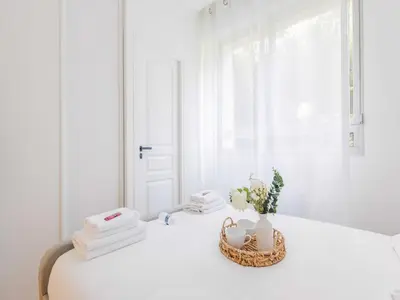 Un ou plusieurs lits dans un hébergement de l'établissement Apartment COSY - 1BDR 2P - Neuilly sur Seine