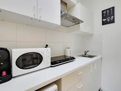 Cuisine ou kitchenette dans l'établissement Spacious Studio - 2P - Levallois-Perret