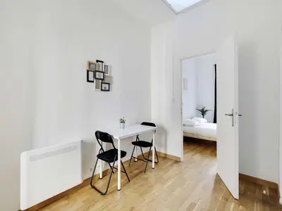 Un ou plusieurs lits dans un hébergement de l'établissement Spacious Studio - 2P - Levallois-Perret
