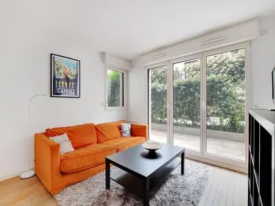 Coin salon dans l'établissement Studio with terrace 2P - Courbevoie