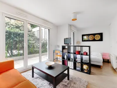 Coin salon dans l'établissement Studio with terrace 2P - Courbevoie