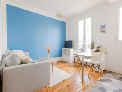 Coin salon dans l'établissement Apartment COSY - 1BDR 2P - Guy Môquet