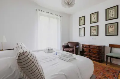Un ou plusieurs lits dans un hébergement de l'établissement Charming Apartment - 1BD 2P - Foch Arc de Triomphe