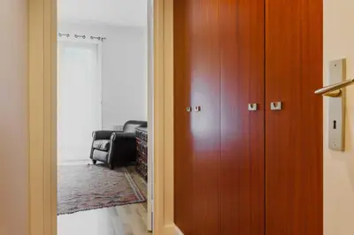 Coin salon dans l'établissement Charming Apartment - 1BD 2P - Foch Arc de Triomphe