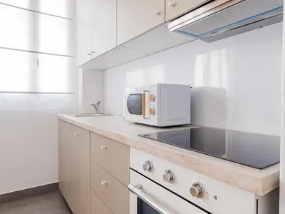 Cuisine ou kitchenette dans l'établissement Superb apartment - Boulogne-Billancourt