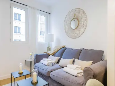 Coin salon dans l'établissement Charming studio 1P Neuilly Seine - Porte Maillot