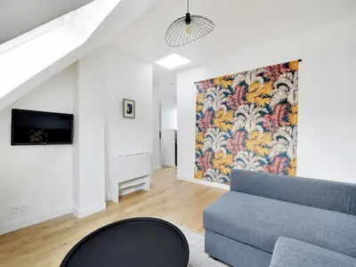 Coin salon dans l'établissement Nice 2 rooms refurbished - MOULIN ROUGE Pigallle - BAIL MOBILITE