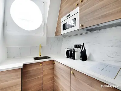 Cuisine ou kitchenette dans l'établissement A Cocoon just a stone's throw from the Arc de Triomphe