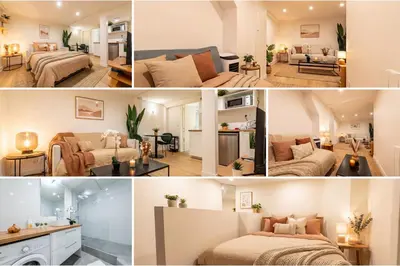 Un ou plusieurs lits dans un hébergement de l'établissement Le Deniro Loft - Tour Eiffel Invalides - 5 personnes