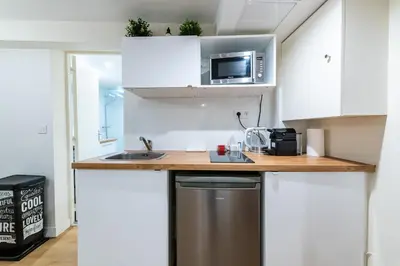 Cuisine ou kitchenette dans l'établissement Le Deniro Loft - Tour Eiffel Invalides - 5 personnes