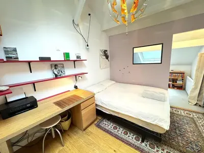 Un ou plusieurs lits dans un hébergement de l'établissement The Pianist - House Loft - Heart of Montparnasse